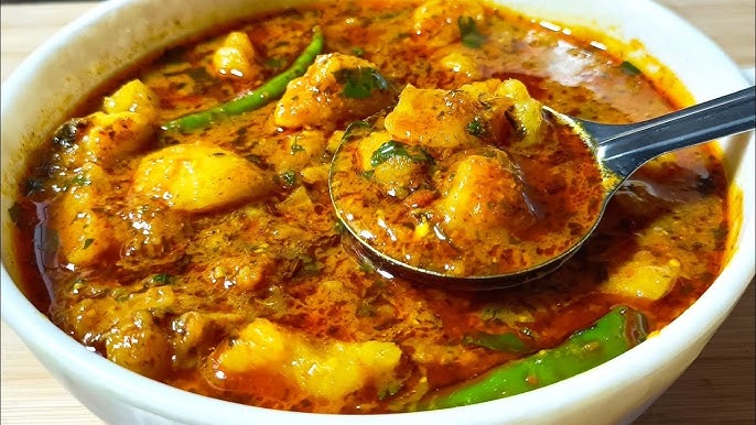 white bowl with Aloo sabji curry.